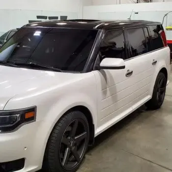 White SUV with dark window tint