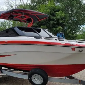 Red and white boat with tint