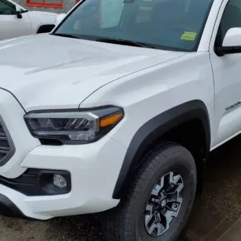 White pickup with tinted windows