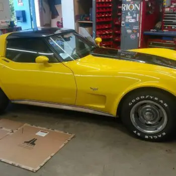 Yellow sports car with tinted windows