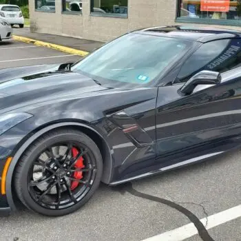 Black sports car with tinted windows
