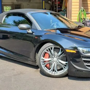 Black sports car with tinted windows