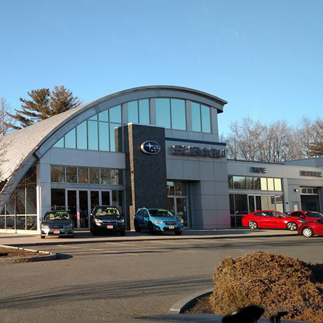 car dealership with glass windows
