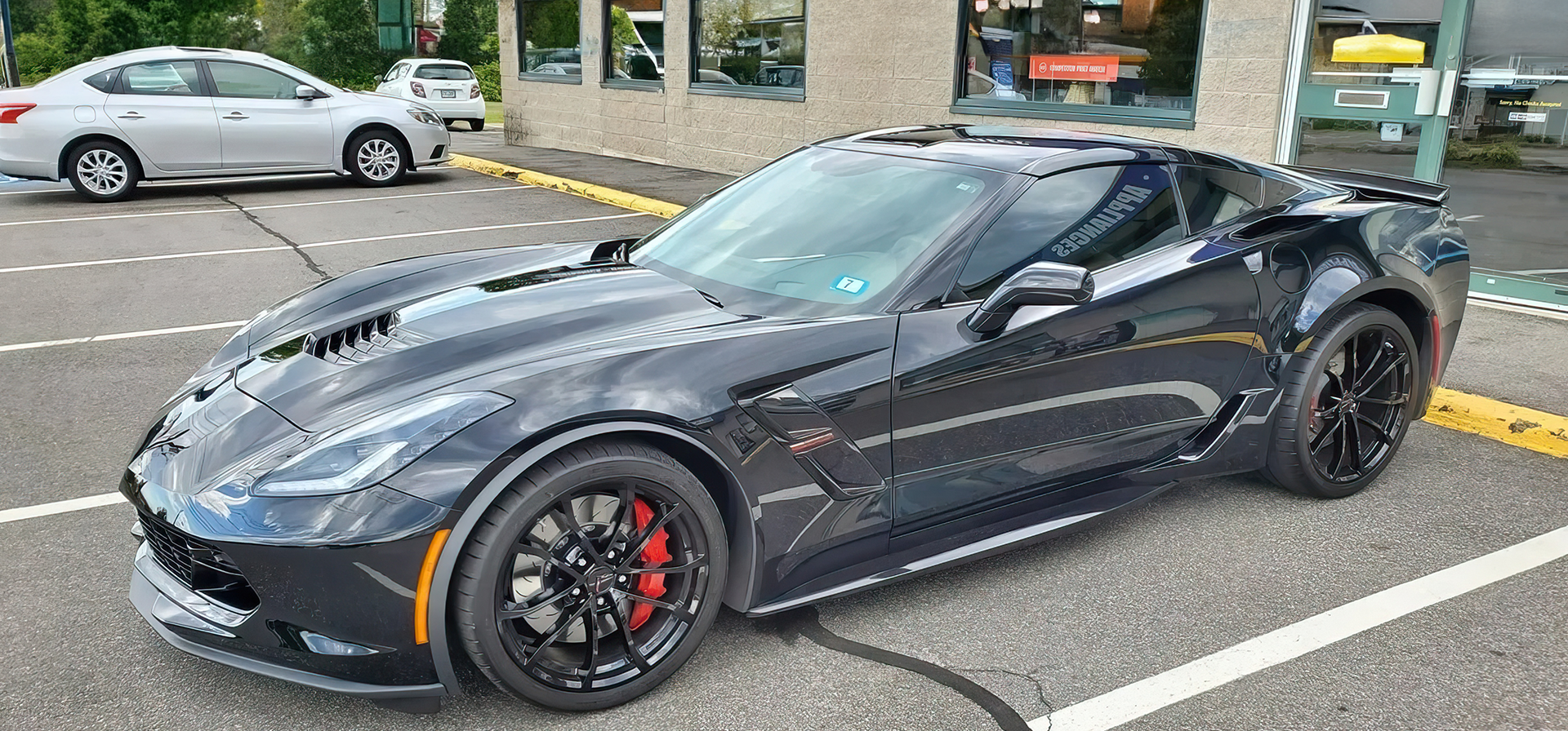 Black sports car with tinted windows